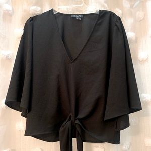 1. State black blouse